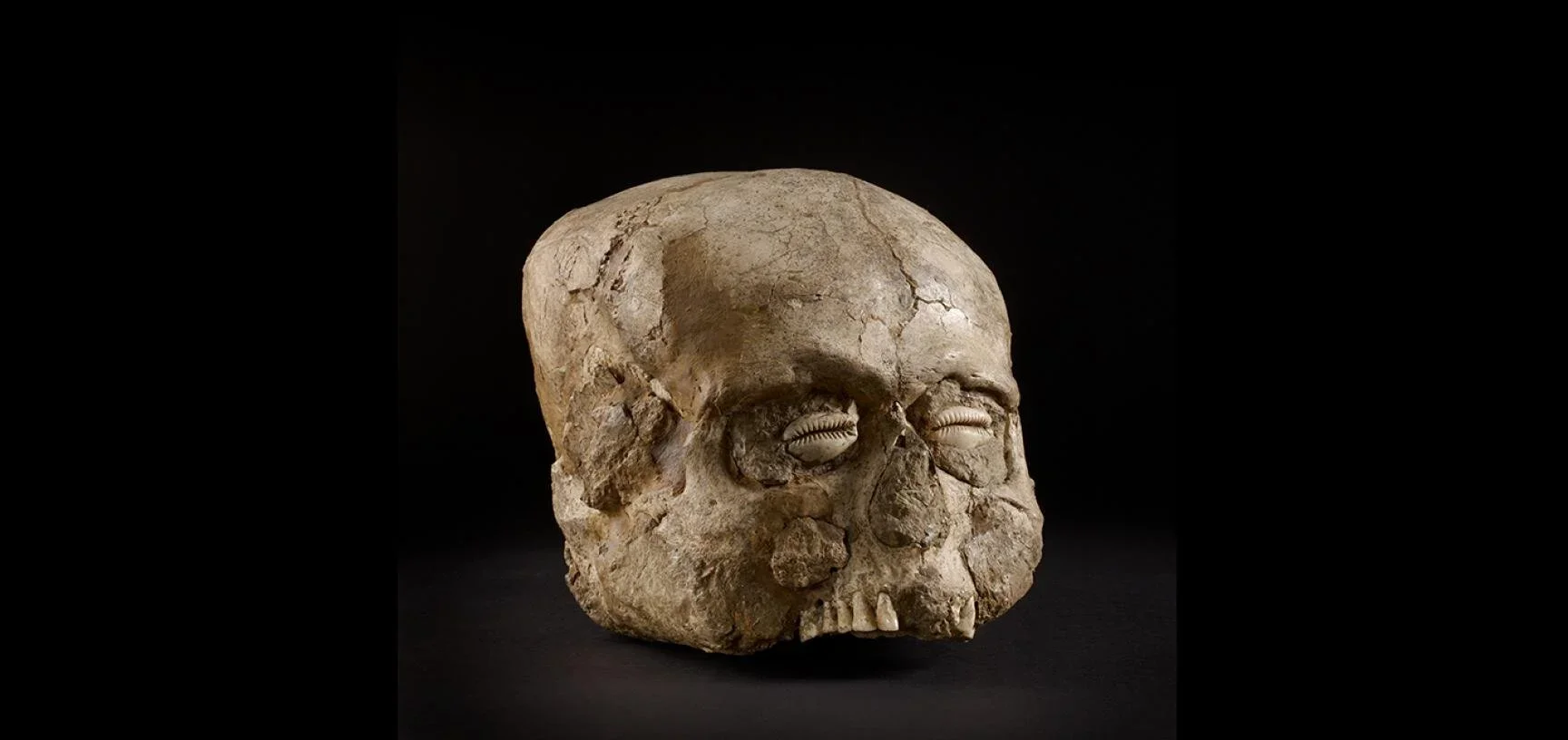 A plastered human skull with shell-inlaid eyes from Jericho, c. 7000 BCE