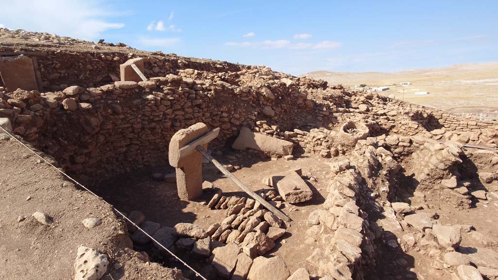 Rock-cut architecture at Karahan Tepe. Structure AO is a small room beside the Central Building, its floor slab carved with a running wild donkey.