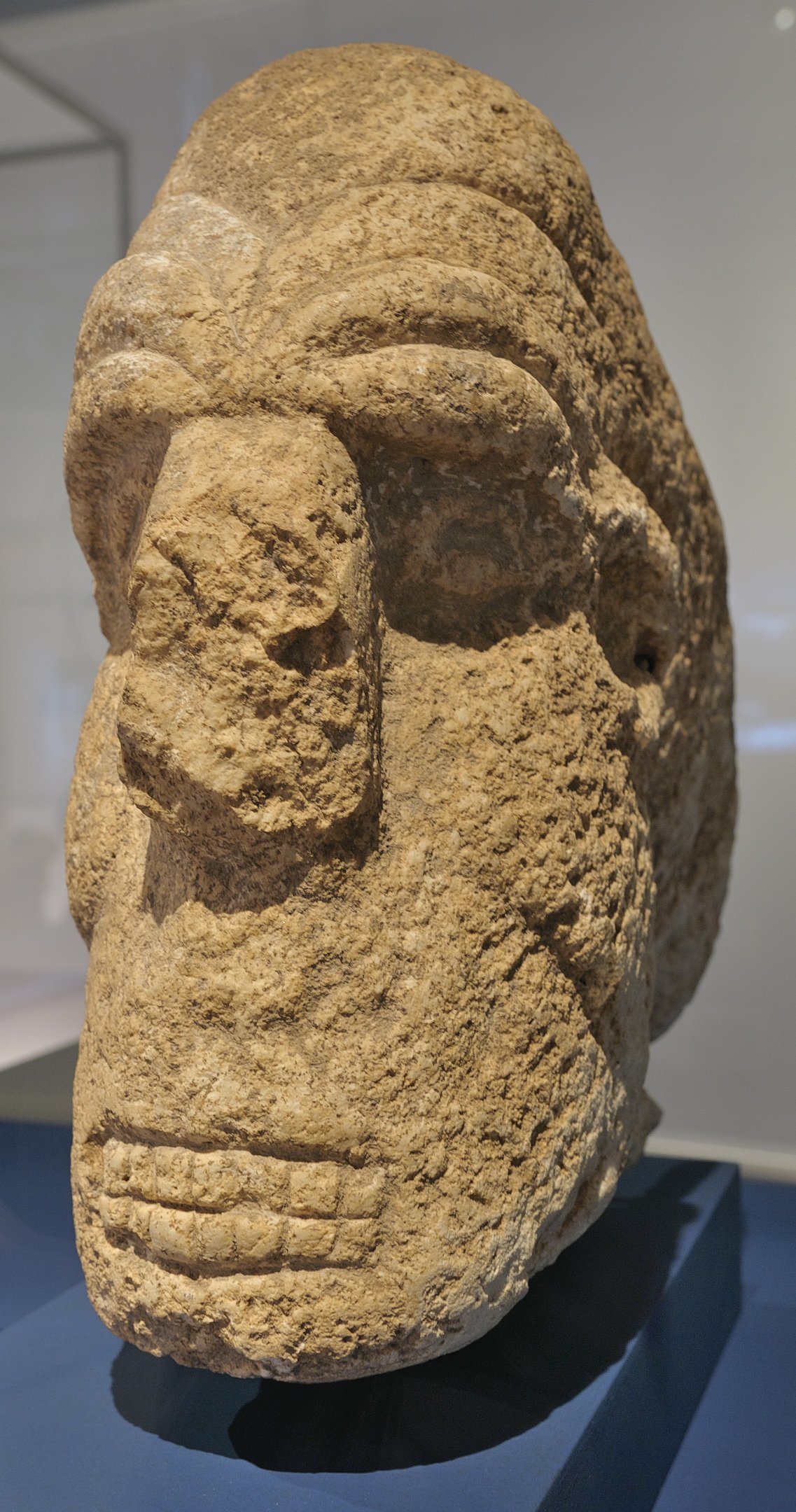 A sculpted human head from Karahan Tepe in a museum collection