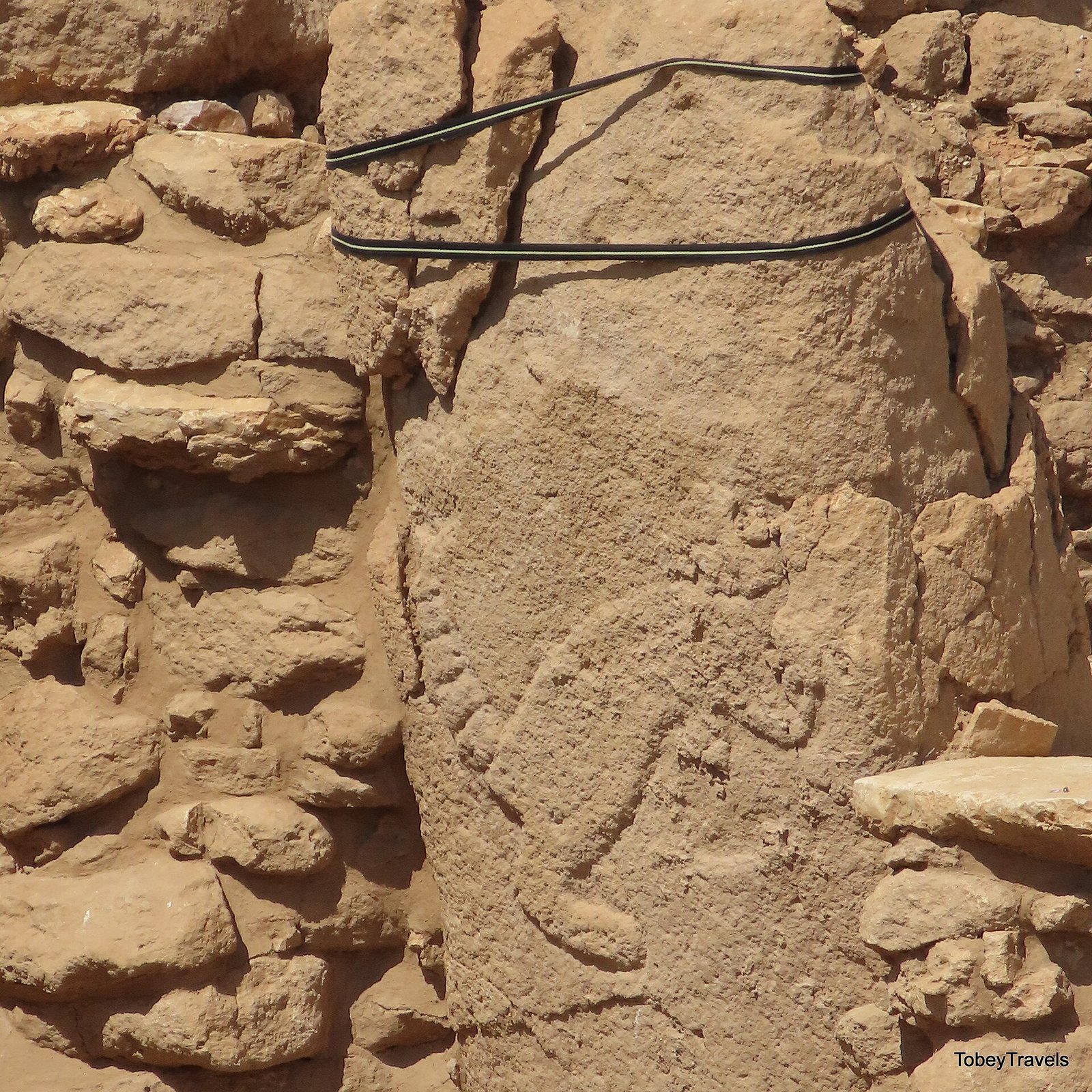 A fox carved in relief on a pillar in Structure AD at Karahan Tepe