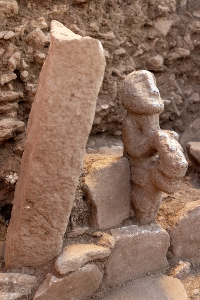 The 2026 Karahan Tepe statue of a human seated on a leopard, found in situ on a stone bench